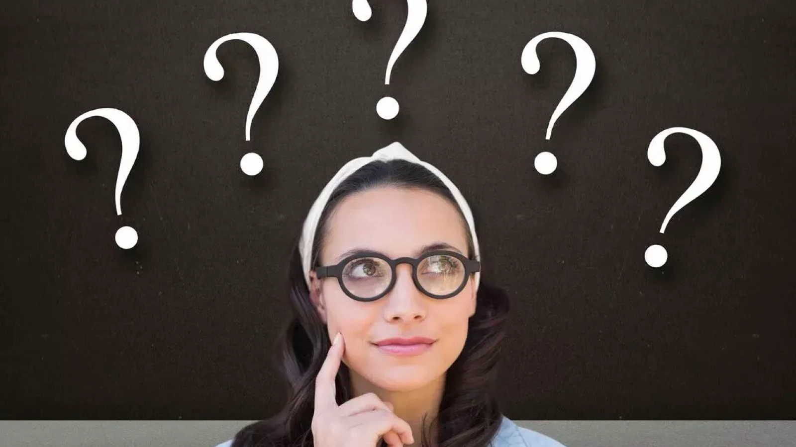 pensive_woman_with_question_marks_cec4a5f371_1_jpg_dcd81f4e6a